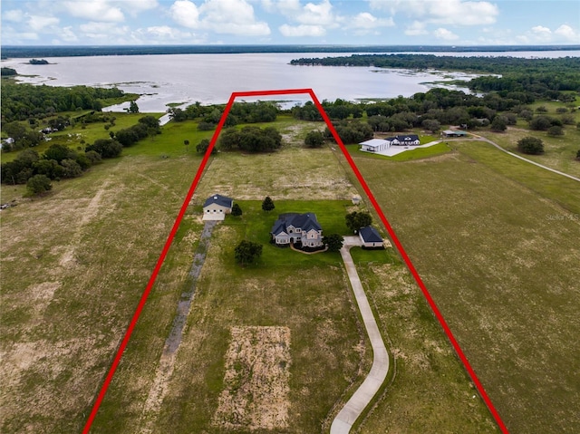 2350 Bradbury Rd, Haines City, FL 33844 - aerial view of property's location featuring a large body of water and property parcel outlined
