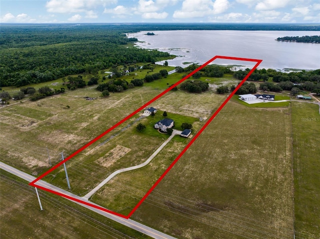 2350 Bradbury Rd, Haines City, FL 33844 - aerial view of property and surrounding area featuring a nearby body of water and property boundaries highlighted