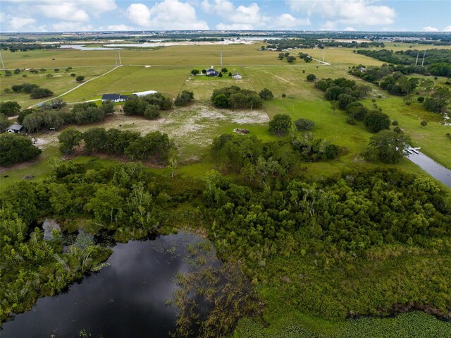 2350 Bradbury Rd, Haines City, FL 33844 - aerial view of property's location featuring a large body of water and rural landscape