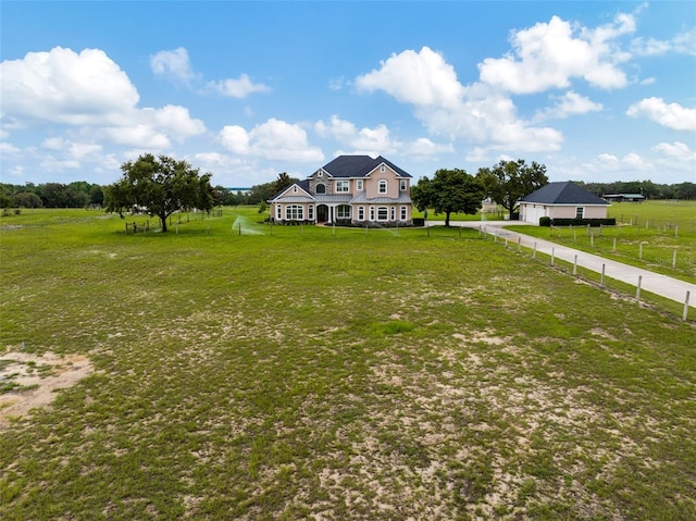 2350 Bradbury Rd, Haines City, FL 33844 - colonial inspired home featuring a view of rural / pastoral area