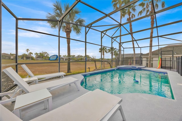 303 Plumoso Loop, Davenport, FL 33897 - view of pool with a patio, glass enclosure, and a pool with connected hot tub