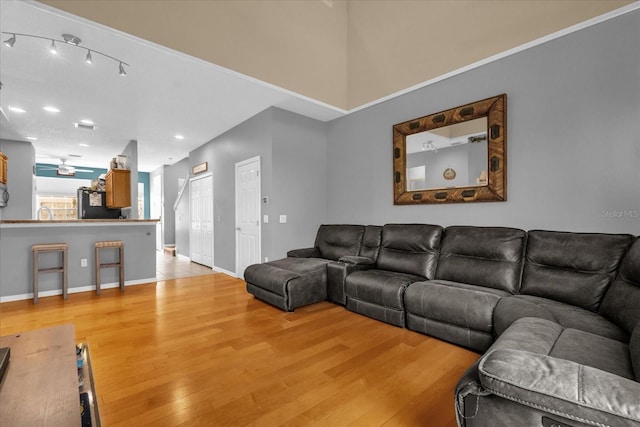 4981 Alita Ter, Saint Cloud, FL 34769 - living room with light wood finished floors, recessed lighting, and baseboards