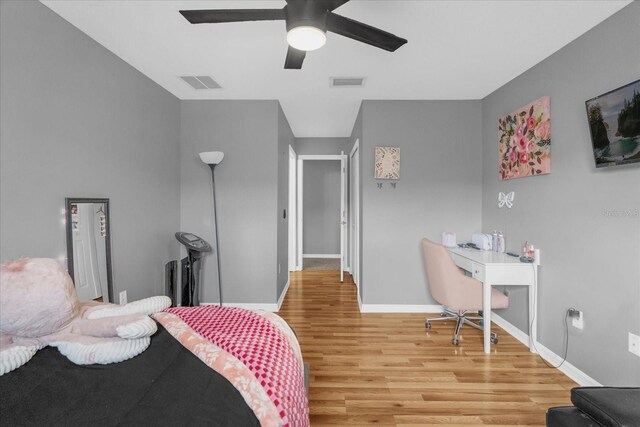 4981 Alita Ter, Saint Cloud, FL 34769 - bedroom featuring light wood-style flooring, baseboards, and ceiling fan