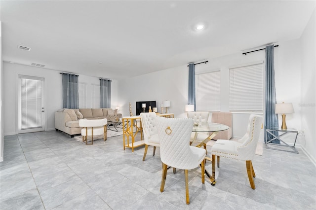 dining area featuring baseboards