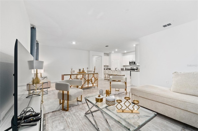 living room with recessed lighting