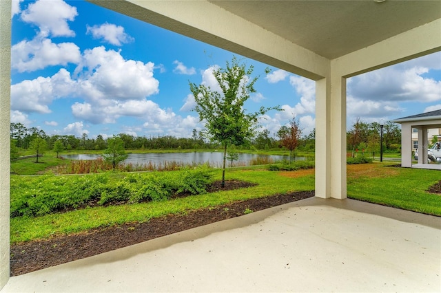 view of patio / terrace featuring a water view