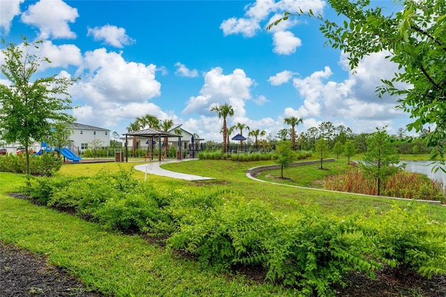 view of community featuring a gazebo and a lawn