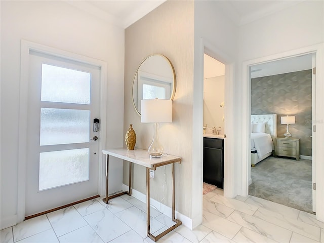 2970 Protagonist St, Kissimmee, FL 34746 - foyer featuring light marble finish flooring and baseboards