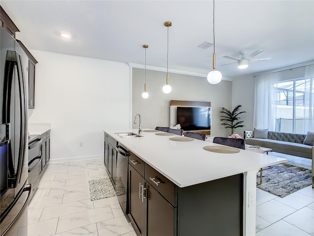 2970 Protagonist St, Kissimmee, FL 34746 - kitchen with a sink, stainless steel fridge, open floor plan, dishwashing machine, and light countertops