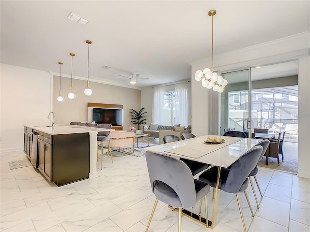 2970 Protagonist St, Kissimmee, FL 34746 - dining area with ceiling fan, ornamental molding, and light marble finish flooring