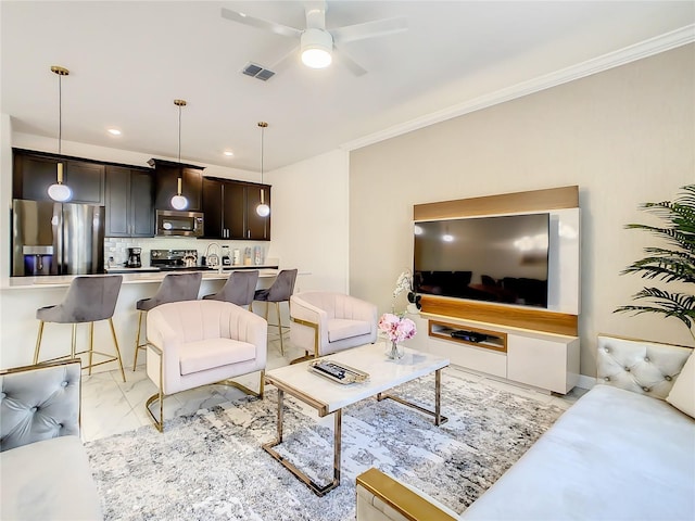 2970 Protagonist St, Kissimmee, FL 34746 - living room featuring ceiling fan, light marble finish flooring, ornamental molding, and recessed lighting