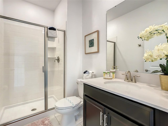 2970 Protagonist St, Kissimmee, FL 34746 - bathroom featuring a shower stall, toilet, vanity, and tile patterned flooring