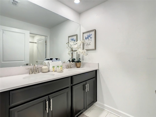 2970 Protagonist St, Kissimmee, FL 34746 - full bath with baseboards, double vanity, marble finish floors, and recessed lighting