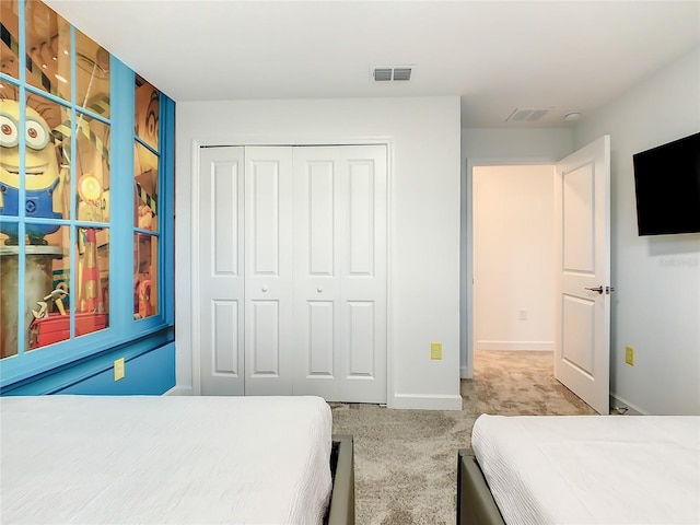2970 Protagonist St, Kissimmee, FL 34746 - bedroom featuring carpet floors, a closet, and baseboards