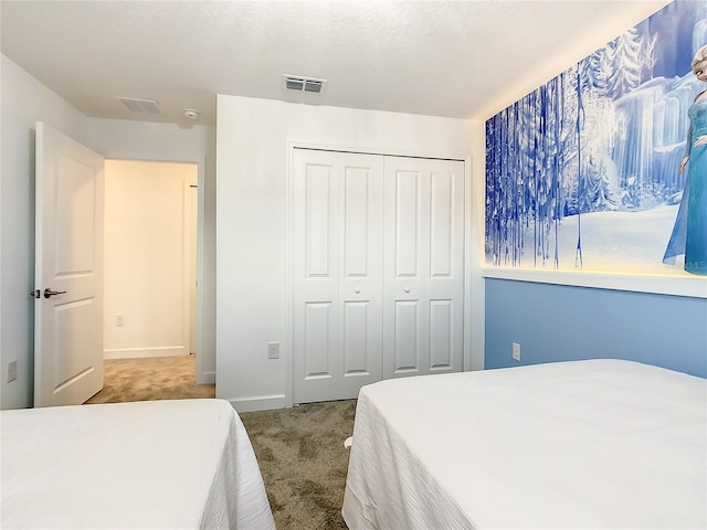 2970 Protagonist St, Kissimmee, FL 34746 - carpeted bedroom featuring a closet and baseboards