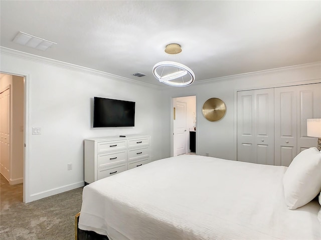 2970 Protagonist St, Kissimmee, FL 34746 - carpeted bedroom with crown molding, baseboards, and a closet