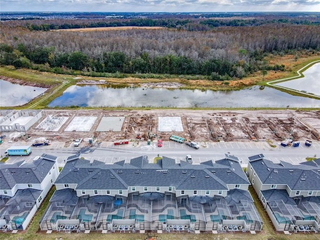 2970 Protagonist St, Kissimmee, FL 34746 - aerial view of residential area featuring a heavily wooded area and a large body of water