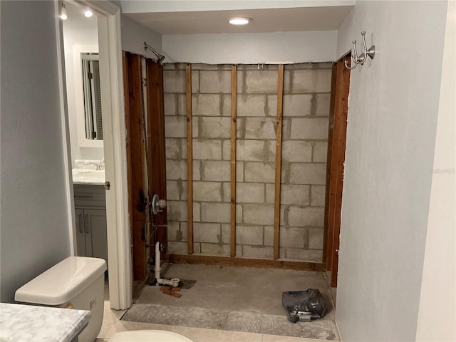 bathroom with toilet and vanity