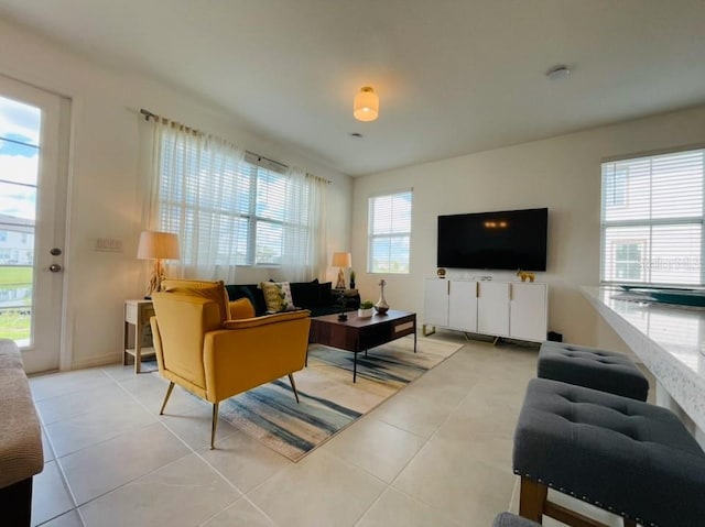 living area with light tile patterned floors