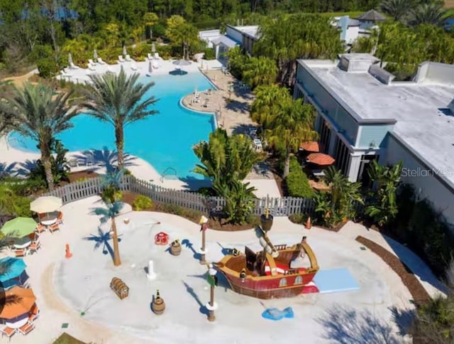 drone / aerial view of a pool