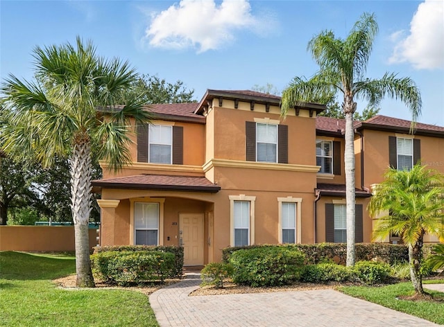 203 La Mirage St, Davenport, FL 33897 - view of front of home featuring stucco siding