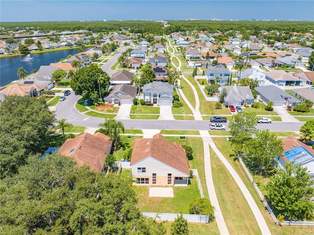 3203 Herons Point Cir, Kissimmee, FL 34741 - aerial perspective of suburban area with a large body of water
