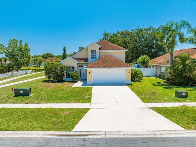 3203 Herons Point Cir, Kissimmee, FL 34741 - traditional-style house with stucco siding, a garage, concrete driveway, a water view, and roof with shingles