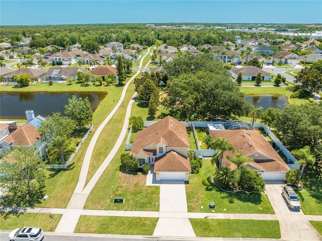 3203 Herons Point Cir, Kissimmee, FL 34741 - aerial perspective of suburban area with a nearby body of water