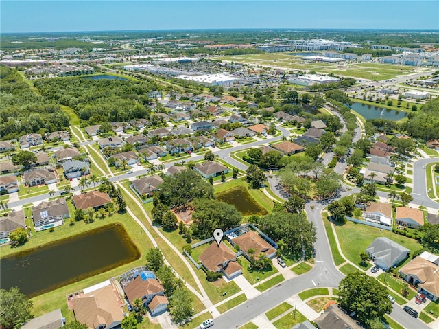 3203 Herons Point Cir, Kissimmee, FL 34741 - aerial view of property and surrounding area featuring a large body of water and nearby suburban area