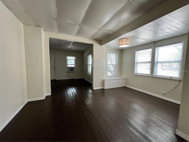 1413 11th St, Saint Cloud, FL 34769 - spare room with baseboards, hardwood / wood-style floors, and cooling unit