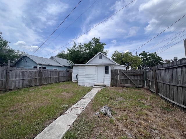 1413 11th St, Saint Cloud, FL 34769 - view of yard featuring an outdoor structure
