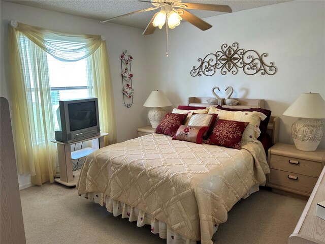 1410 Sanchez Ct, Lady Lake, FL 32159 - bedroom featuring light carpet and ceiling fan