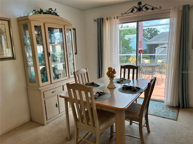 1410 Sanchez Ct, Lady Lake, FL 32159 - dining space with light colored carpet and baseboards