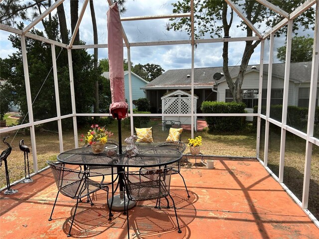 1410 Sanchez Ct, Lady Lake, FL 32159 - sunroom featuring outdoor dining space