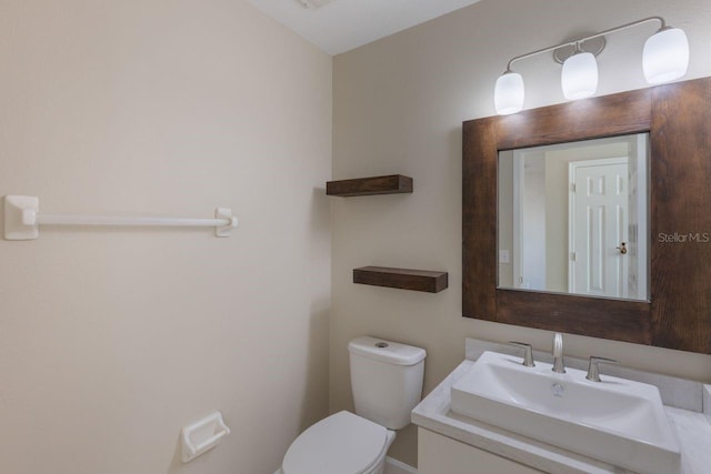 12303 Bohannon Blvd, Orlando, FL 32824 - bathroom featuring toilet and vanity