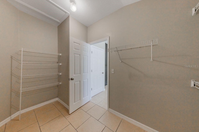 12303 Bohannon Blvd, Orlando, FL 32824 - spacious closet with light tile patterned floors