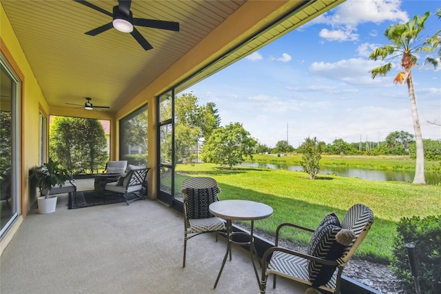 517 Milano Rd, Poinciana, FL 34759 - sunroom / solarium featuring a ceiling fan and a water view