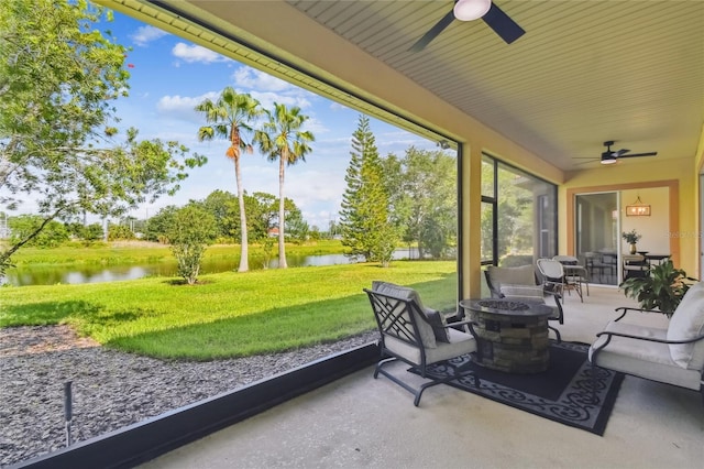 517 Milano Rd, Poinciana, FL 34759 - sunroom featuring ceiling fan and a water view