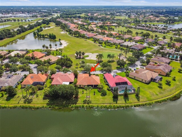 517 Milano Rd, Poinciana, FL 34759 - aerial view of residential area featuring a nearby body of water and a golf club