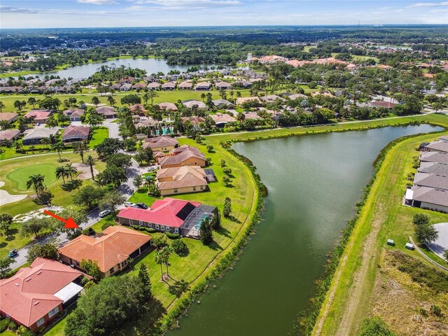 517 Milano Rd, Poinciana, FL 34759 - aerial perspective of suburban area with a large body of water
