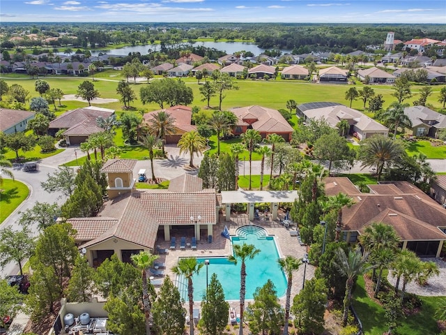 517 Milano Rd, Poinciana, FL 34759 - aerial view of residential area with a nearby body of water and a pool area
