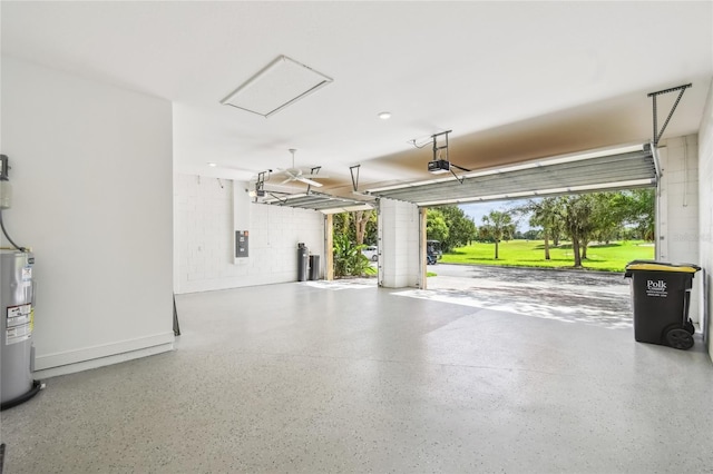 517 Milano Rd, Poinciana, FL 34759 - garage featuring water heater, a garage door opener, and electric panel