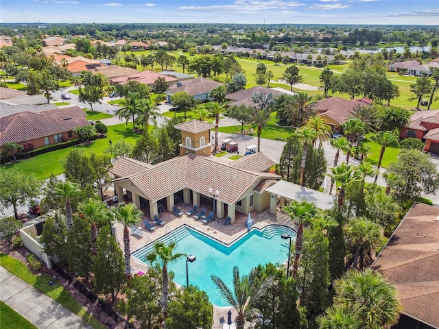 517 Milano Rd, Poinciana, FL 34759 - aerial perspective of suburban area featuring a pool area