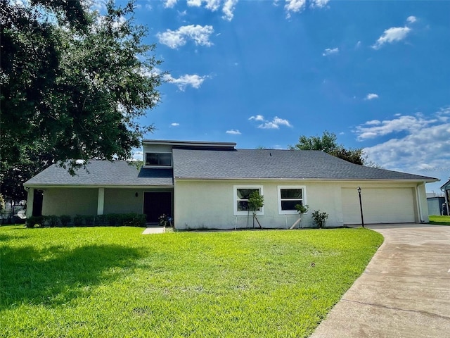7200 Green Pine Ct, Orlando, FL 32819 - mid-century modern home with concrete driveway, an attached garage, stucco siding, and a front yard