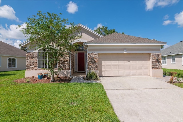 view of front of home featuring stone siding, driveway, an attached garage, and a front yard