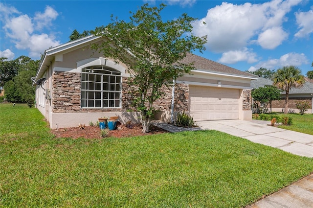 view of front of property with stone siding, an attached garage, concrete driveway, and a front yard