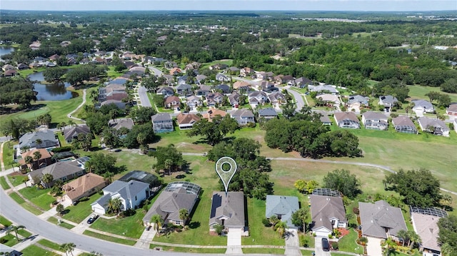view of property location featuring nearby suburban area and a large body of water
