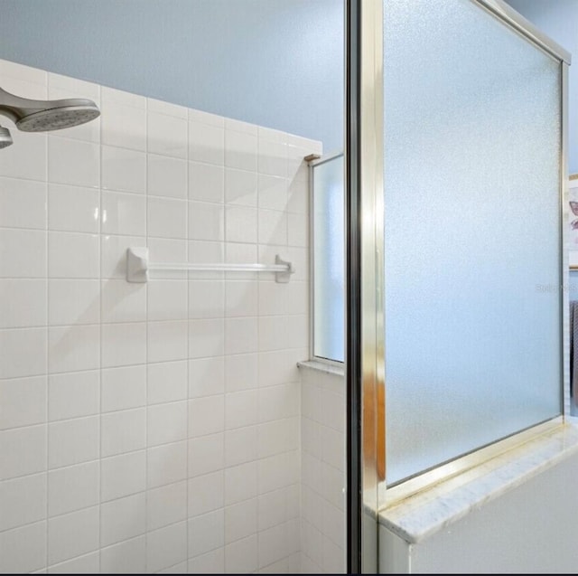 2567 Oneida Loop, Kissimmee, FL 34747 - bathroom with a shower stall