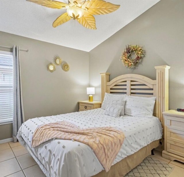 2567 Oneida Loop, Kissimmee, FL 34747 - bedroom featuring light tile patterned flooring and ceiling fan