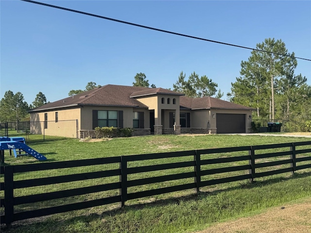 18805 Nettleton St, Orlando, FL 32833 - view of front of property with stucco siding and a garage